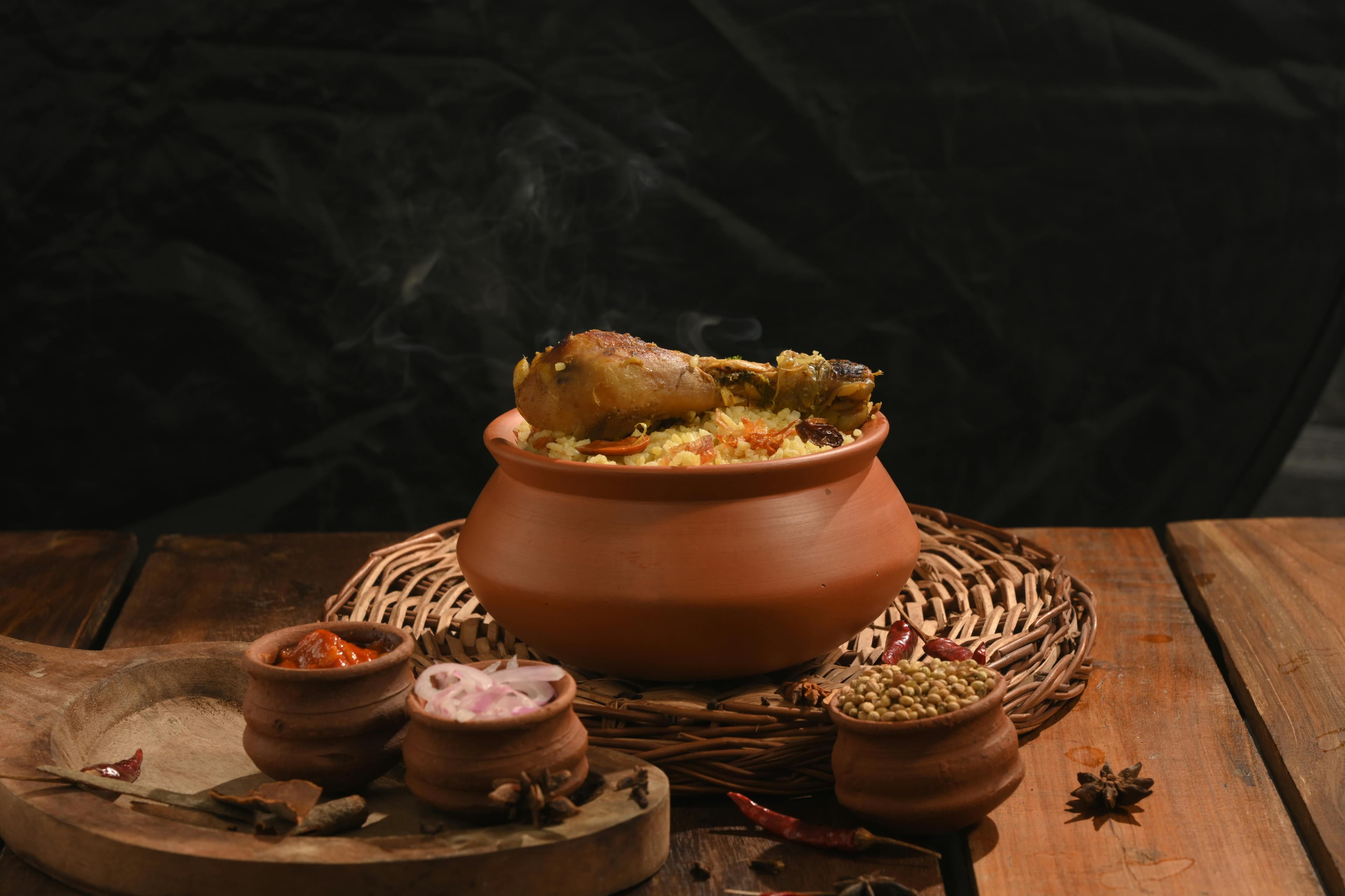 Traditional Kerala chicken biryani in clay pot by Shalini Shakthi on Pexels